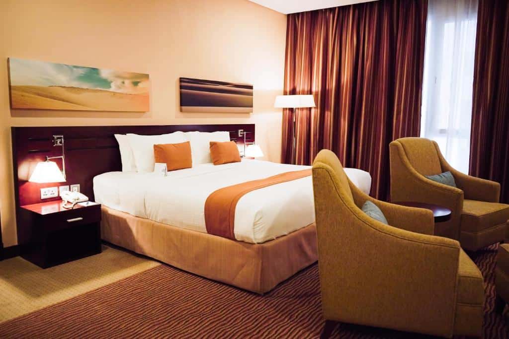 city seasons hotel and suites muscat chambre deluxe