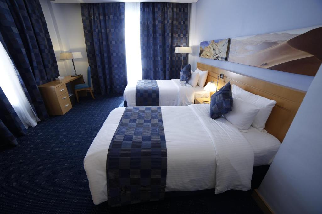 city seasons hotel and suites muscat chambre simple