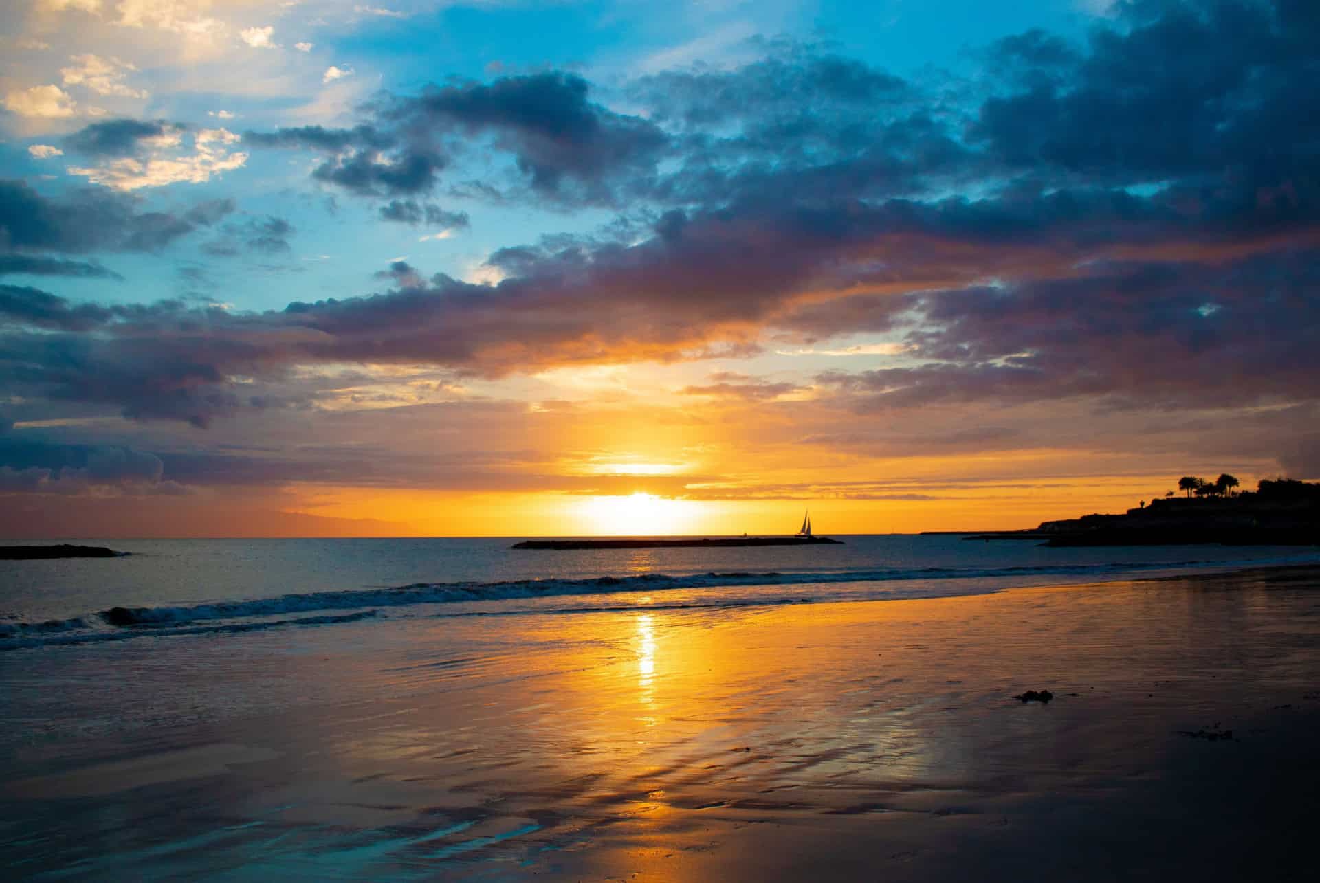 plage las americas coucher soleil